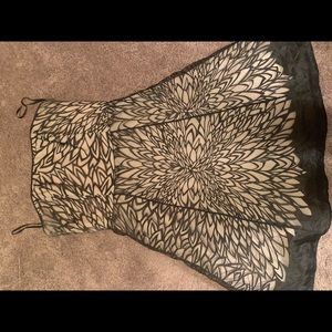 Light pink and black strapless dress